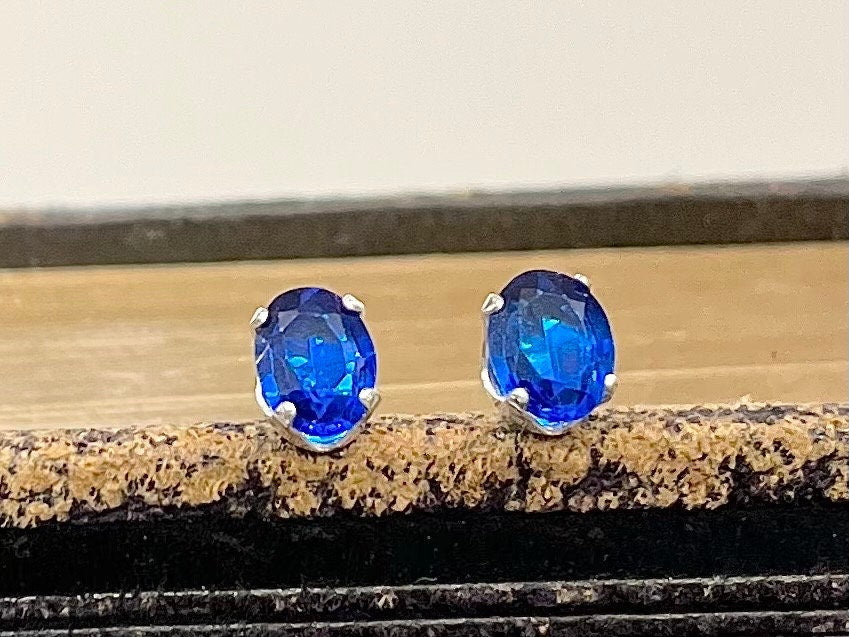 Sterling Silver Cobalt Blue Synthetic Spinel Oval Cut Stud Earrings with a UV Reactive Pink Glow Jewellery TheGreenGlassGemShop