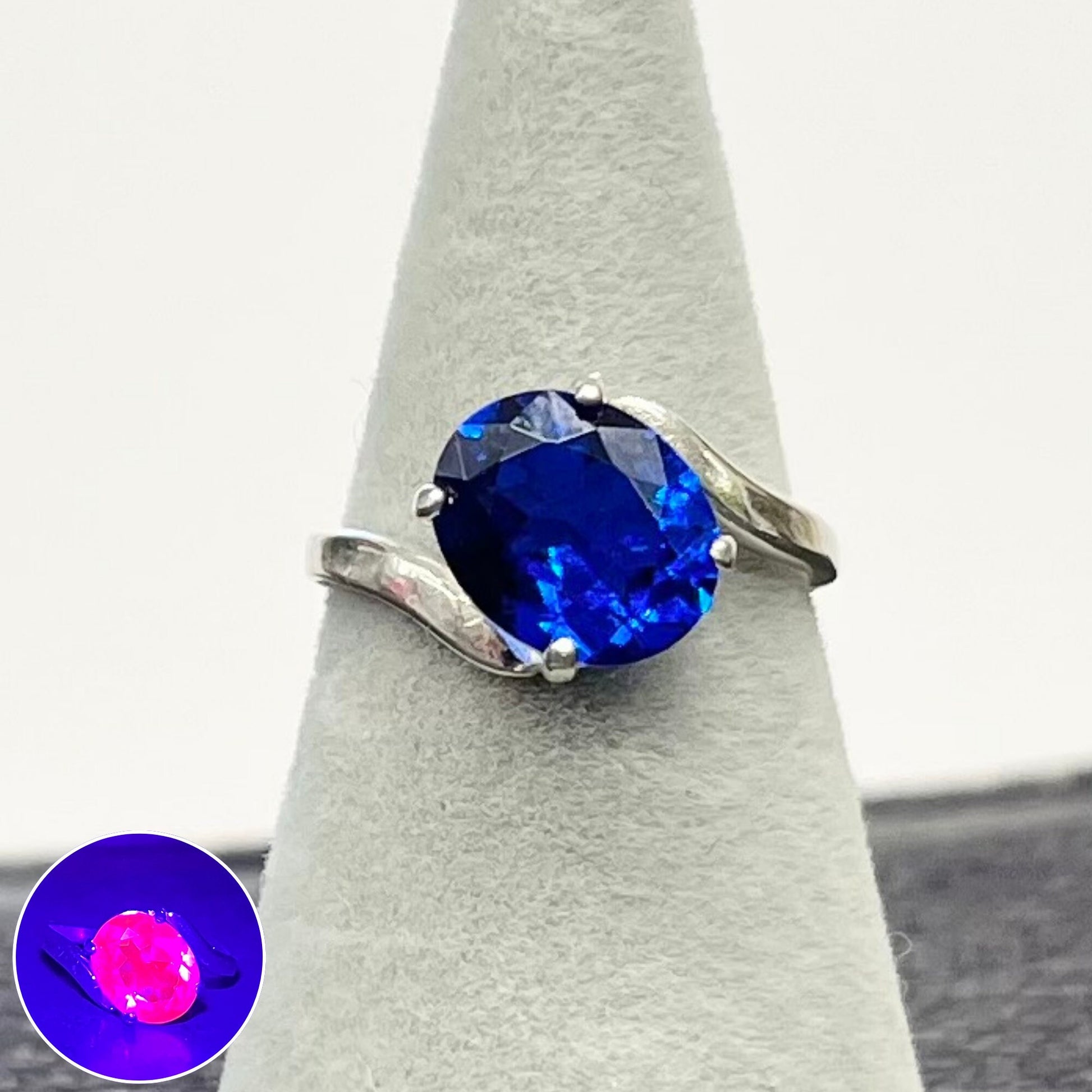 Sterling Silver Cobalt Blue Synthetic Spinel Oval Cut Crystal Twist Ring with a UV Reactive Pink Glow UV Jewellery Size K 1/2 TheGreenGlassGemShop