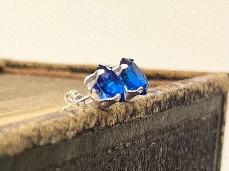 Sterling Silver Cobalt Blue Synthetic Spinel Oval Cut Stud Earrings with a UV Reactive Pink Glow Jewellery TheGreenGlassGemShop