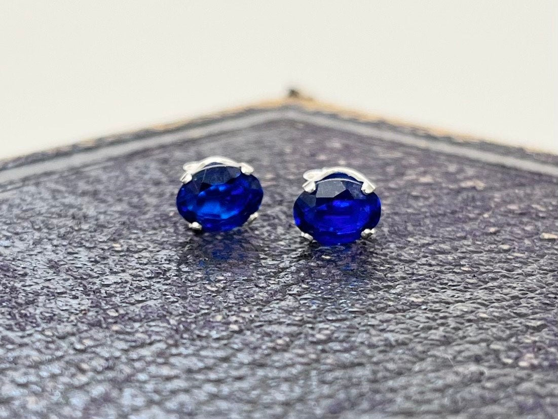 Sterling Silver Cobalt Blue Synthetic Spinel Oval Cut Stud Earrings with a UV Reactive Pink Glow Jewellery TheGreenGlassGemShop