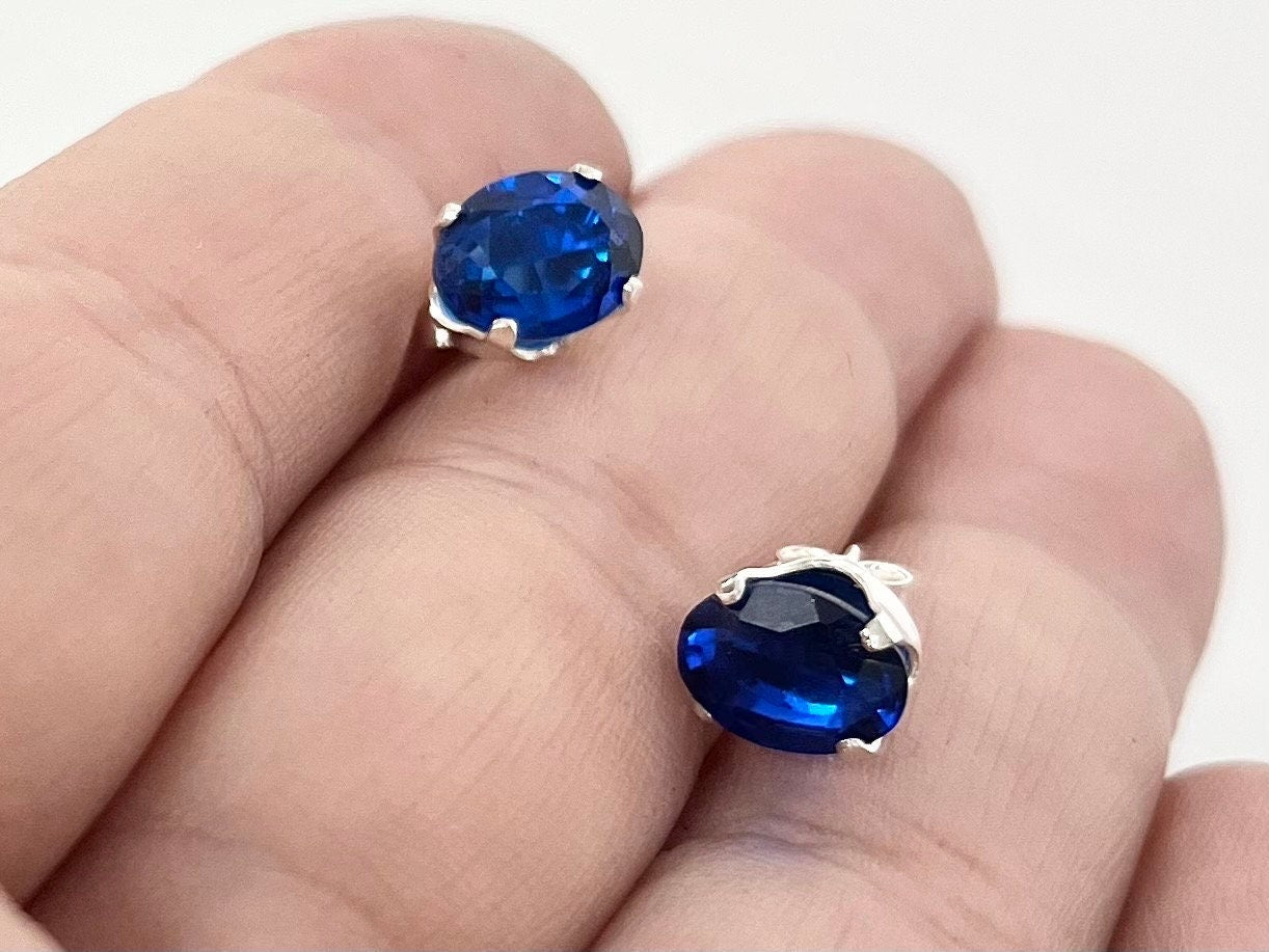 Sterling Silver Cobalt Blue Synthetic Spinel Oval Cut Stud Earrings with a UV Reactive Pink Glow Jewellery TheGreenGlassGemShop