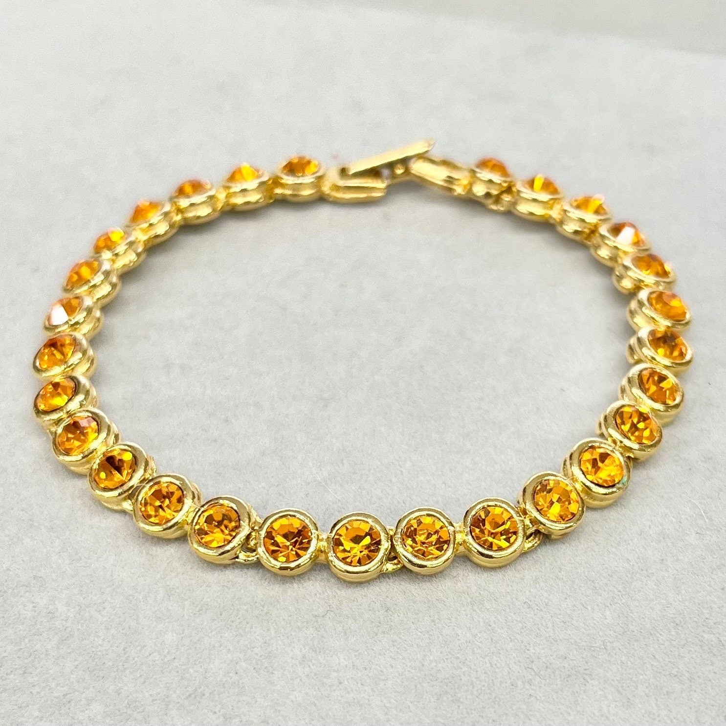 Vintage Orange Cadmium Glass Crystal Tennis Bracelet Gold Tone Metal UV Reactive Glow Jewellery TheGreenGlassGemShop