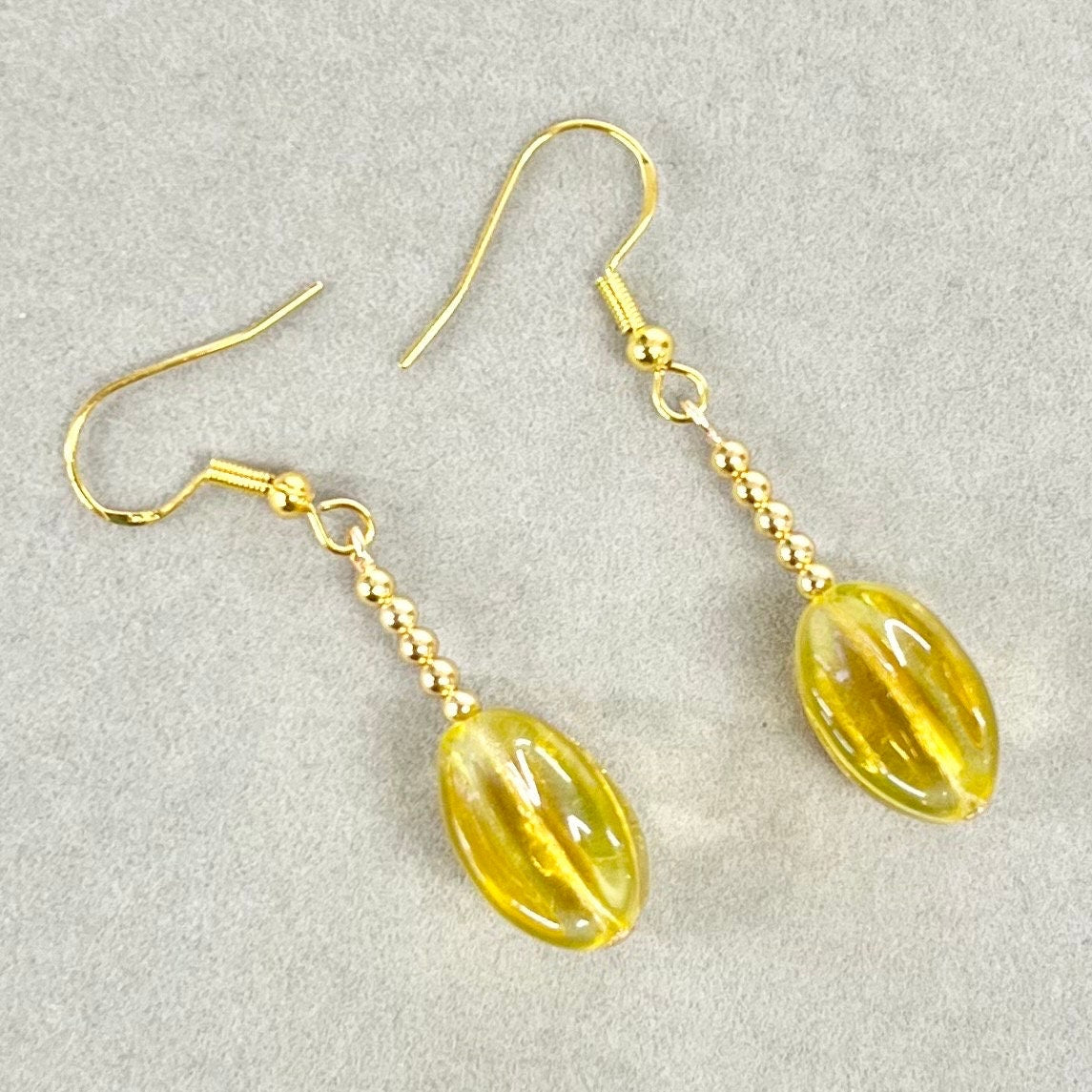 Vintage Yellow Uranium Glass Bead Drop Earrings Gold Plate with a UV Reactive Glow TheGreenGlassGemShop