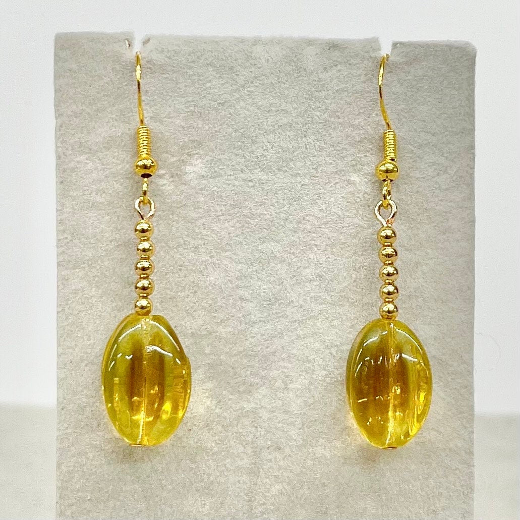 Vintage Yellow Uranium Glass Bead Drop Earrings Gold Plate with a UV Reactive Glow TheGreenGlassGemShop