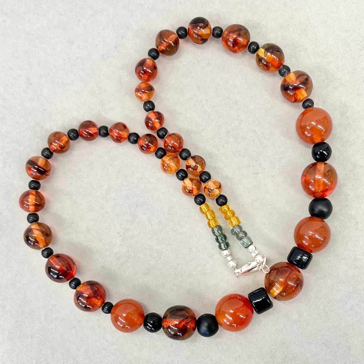 Vintage Carnelian Swirl Glass Uranium Graduated Bead Necklace Orange & Black Beads Bright Green / Yellow UV Reactive Glow 18” TheGreenGlassGemShop