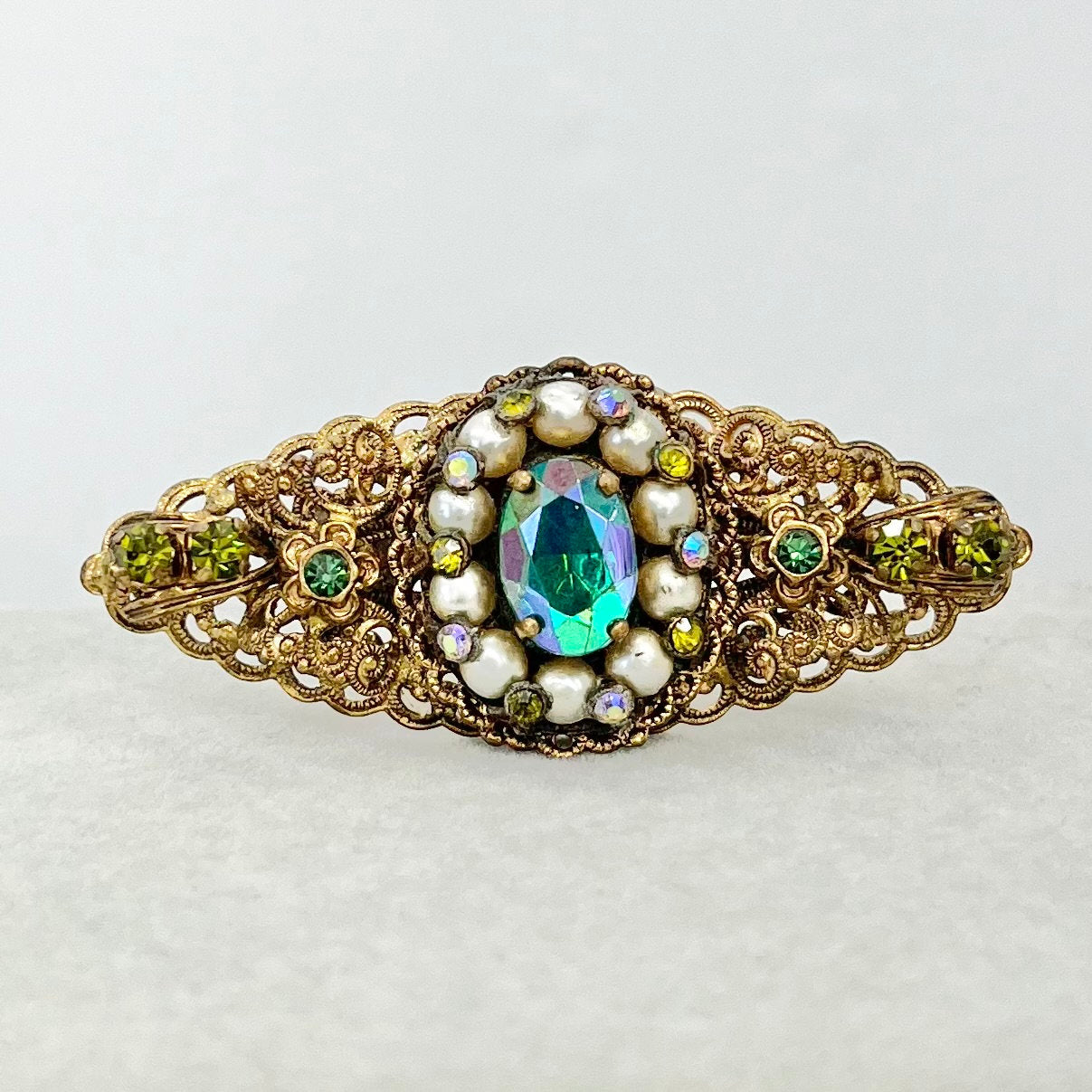 Antique Green Crystal Brooch in a Brass Stamping Filigree Setting Beautifully Made Vintage Brooch TheGreenGlassGemShop