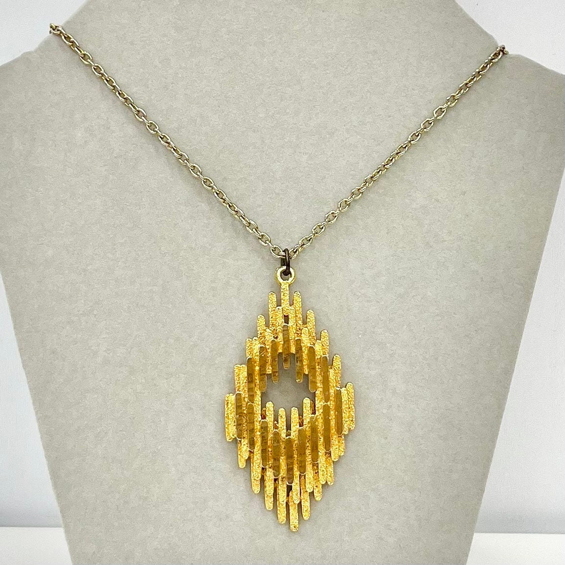 Vintage 1970‘s Gold Plate Brutalist Pendant Necklace in a Layered Diamond Shape Design with a 27” Chain TheGreenGlassGemShop