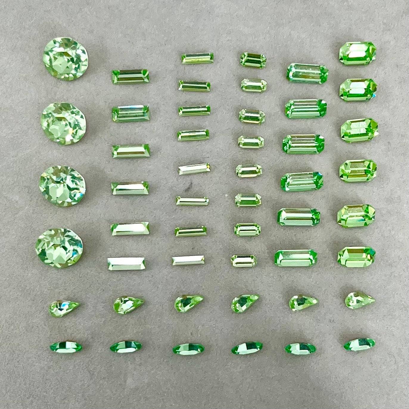 Pack of 50 Rare Uranium Vaseline Glass Swarovski Crystals 8 Different Shapes & Sizes Emerald Round Baguette Marquise Pear Cuts Rare Shapes TheGreenGlassGemShop