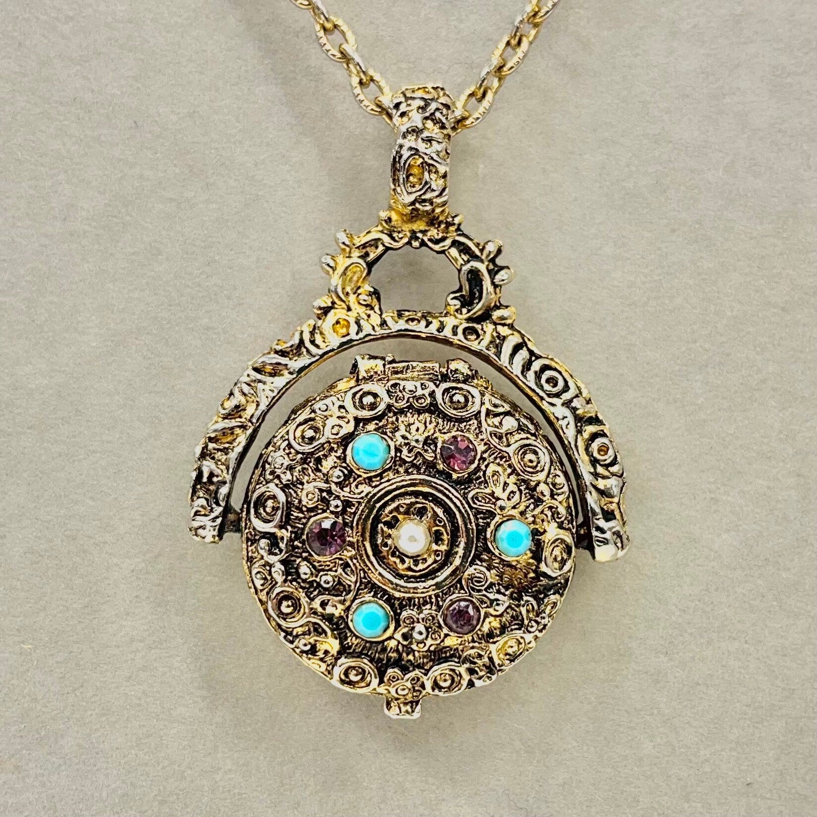 Vintage Victorian Style 1970‘s Gold Tone Round Spinning Locket Pendant Necklace with Amethyst & Turquoise Crystal Accents 24” Chain TheGreenGlassGemShop