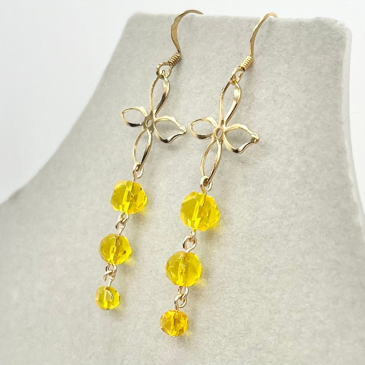 Handmade Yellow Cadmium Glass Bead Drop Trio Flower Earrings Gold Plate with UV Reactive Orange Glow TheGreenGlassGemShop