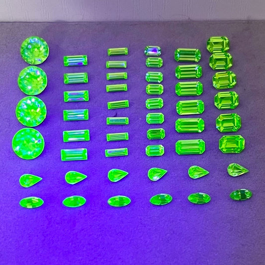 Pack of 50 Rare Uranium Vaseline Glass Swarovski Crystals 8 Different Shapes & Sizes Emerald Round Baguette Marquise Pear Cuts Rare Shapes TheGreenGlassGemShop