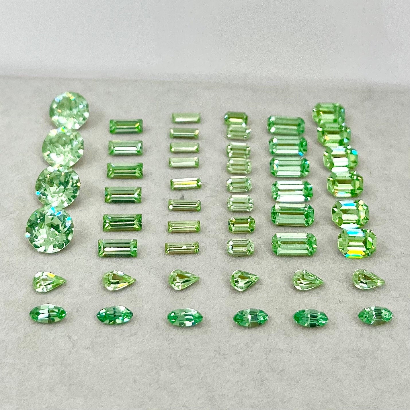 Pack of 50 Rare Uranium Vaseline Glass Swarovski Crystals 8 Different Shapes & Sizes Emerald Round Baguette Marquise Pear Cuts Rare Shapes TheGreenGlassGemShop