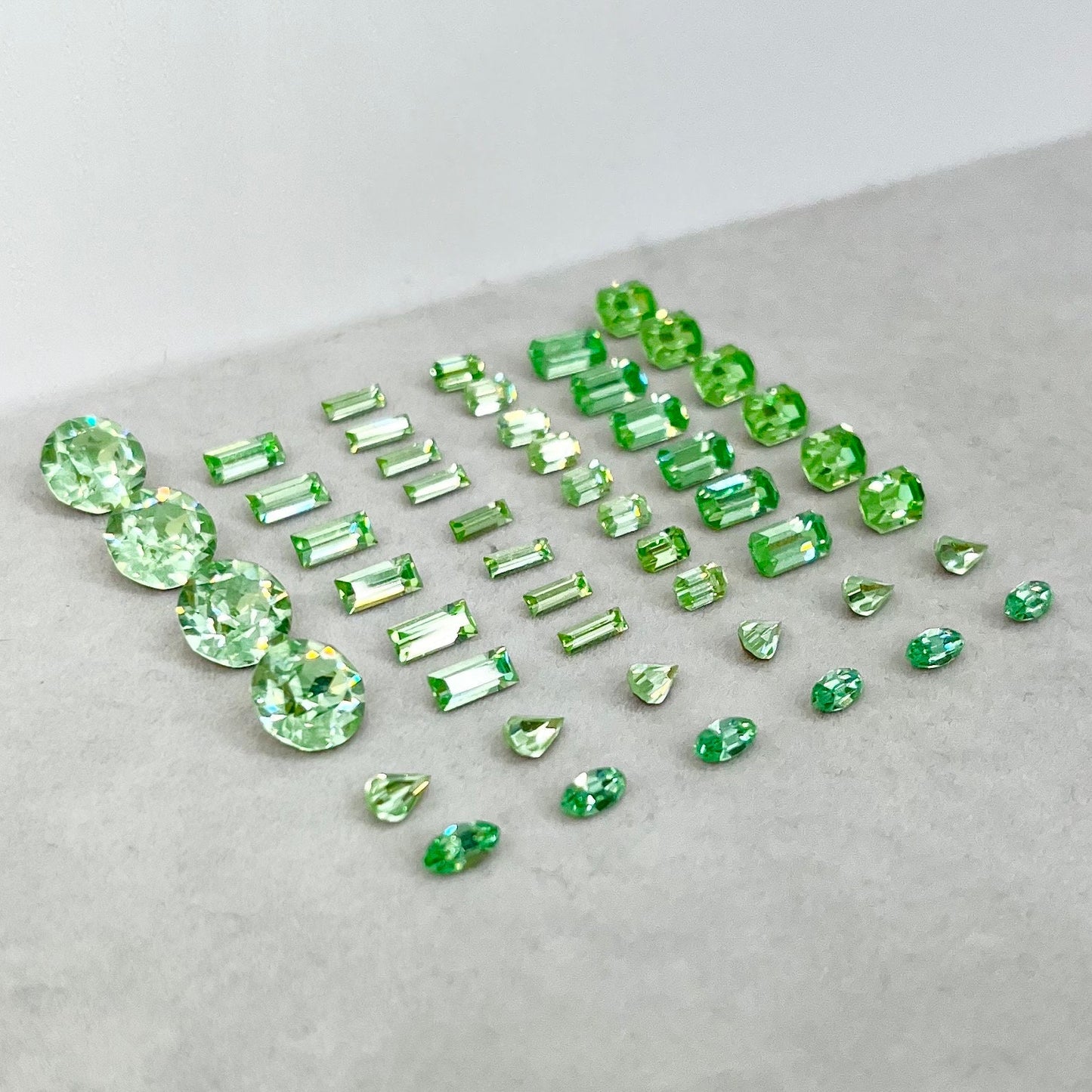 Pack of 50 Rare Uranium Vaseline Glass Swarovski Crystals 8 Different Shapes & Sizes Emerald Round Baguette Marquise Pear Cuts Rare Shapes TheGreenGlassGemShop