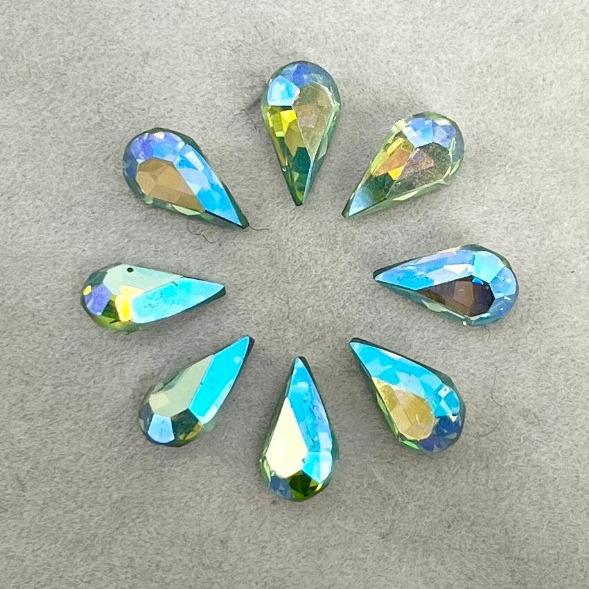 Pack of 8 Rare Uranium Vaseline Glass Swarovski Crystals Faceted AB Pear Cut 6x10mm Rare Cut TheGreenGlassGemShop