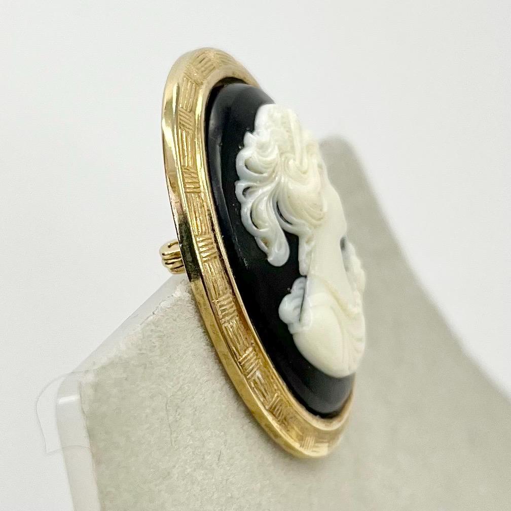 Vintage Black Cream Faux Cameo Brooch in a Gold Tone Filigree Setting Victorian Style TheGreenGlassGemShop