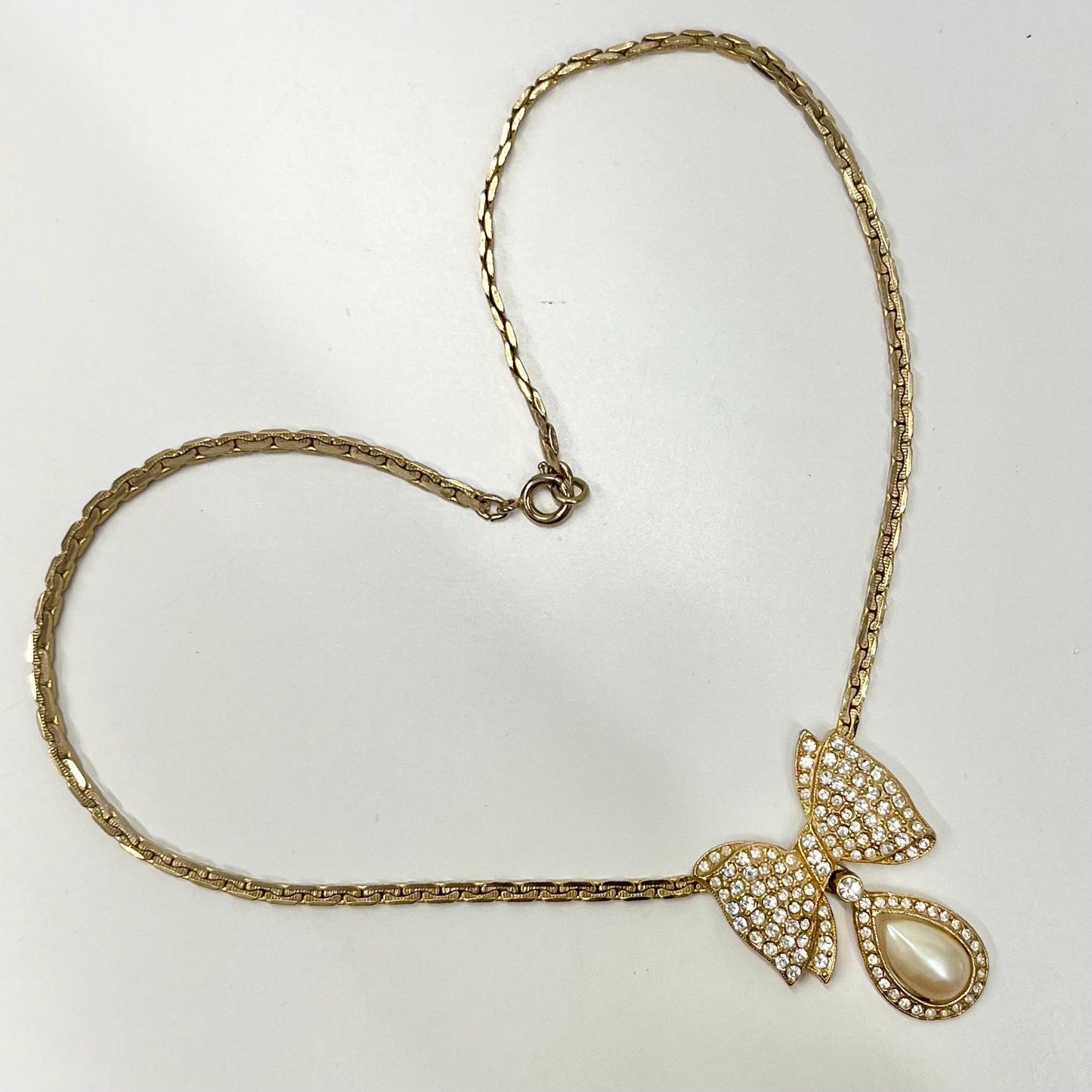 Vintage Gold Plated Diamante Bow Necklace with a Teardrop Faux Pearl Drop TheGreenGlassGemShop