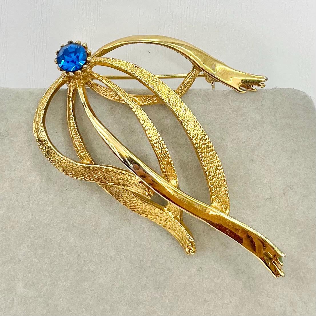 Vintage Hollywood Gold Tone Brutalist Ribbon Brooch with Blue Crystal Accents Contempory Costume Jewellery Statement Piece TheGreenGlassGemShop