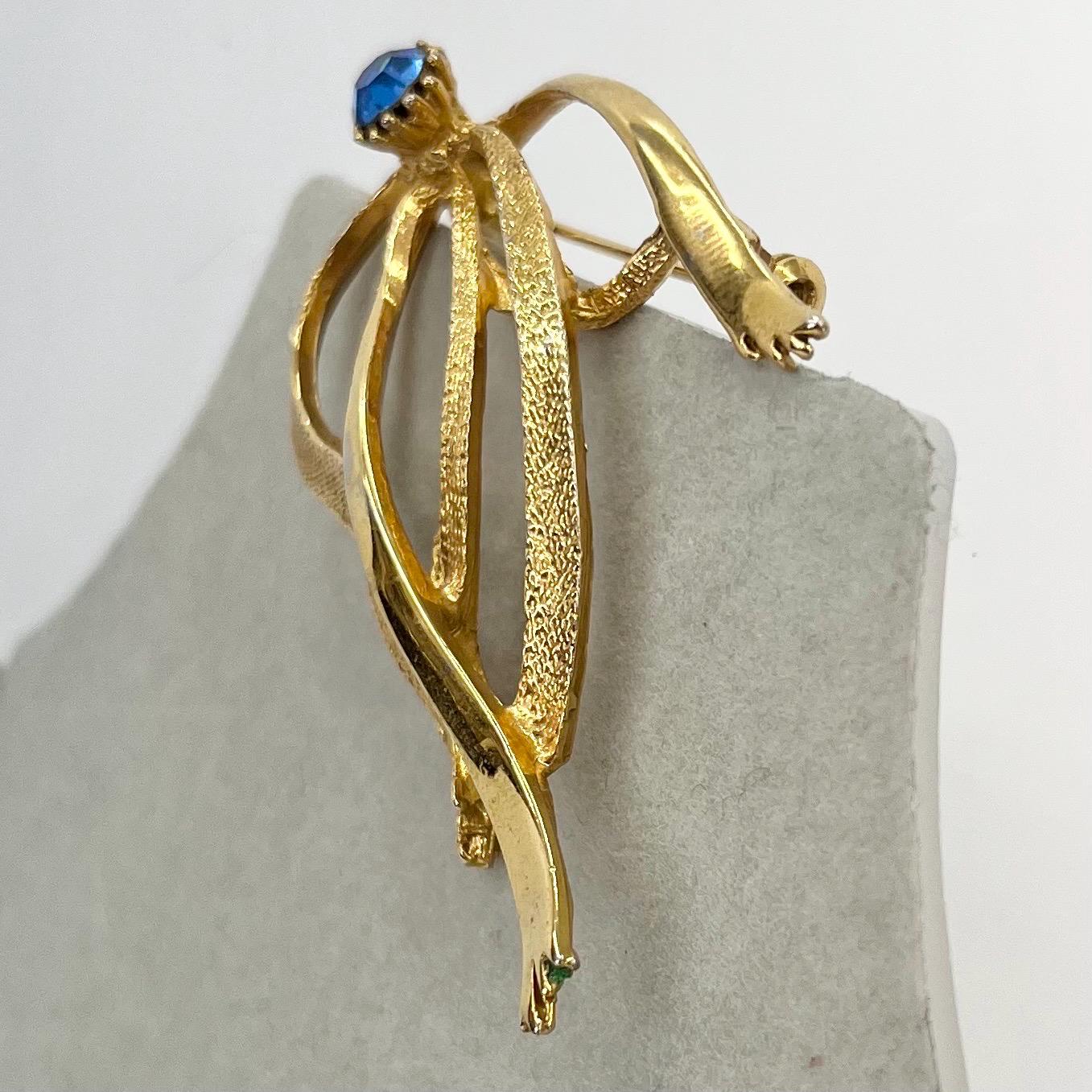 Vintage Hollywood Gold Tone Brutalist Ribbon Brooch with Blue Crystal Accents Contempory Costume Jewellery Statement Piece TheGreenGlassGemShop