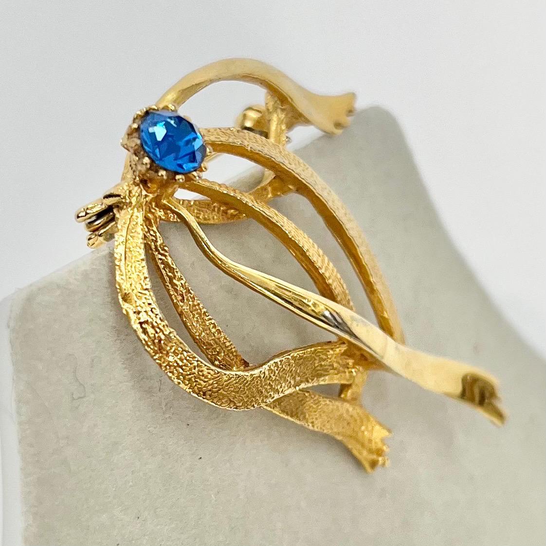 Vintage Hollywood Gold Tone Brutalist Ribbon Brooch with Blue Crystal Accents Contempory Costume Jewellery Statement Piece TheGreenGlassGemShop